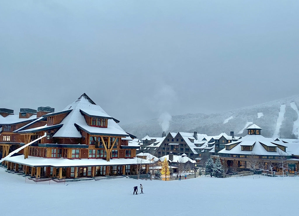 Panoramic view to the Stowe Mountain resort Spruce peak village at evening time early December 2020 Vermont, USA