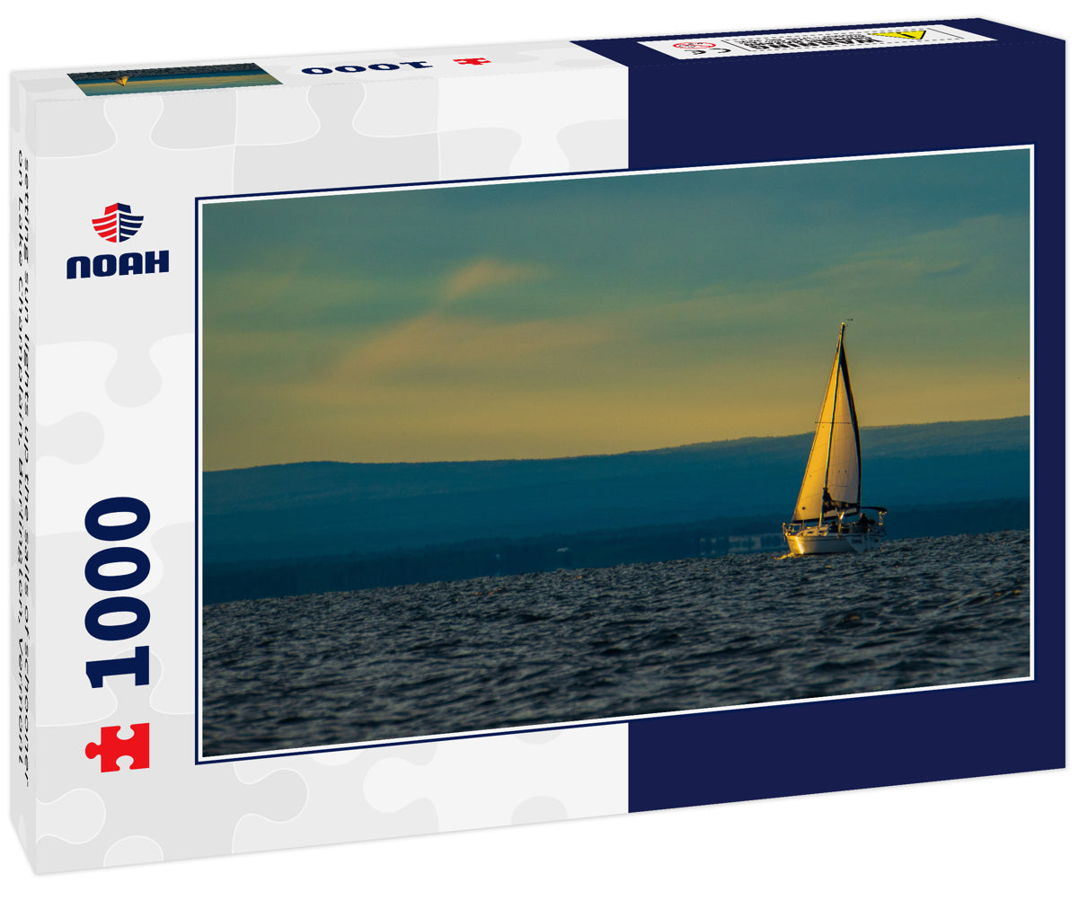 setting sun lights up the sails of schooner on Lake Champlain, Burlington, Vermont