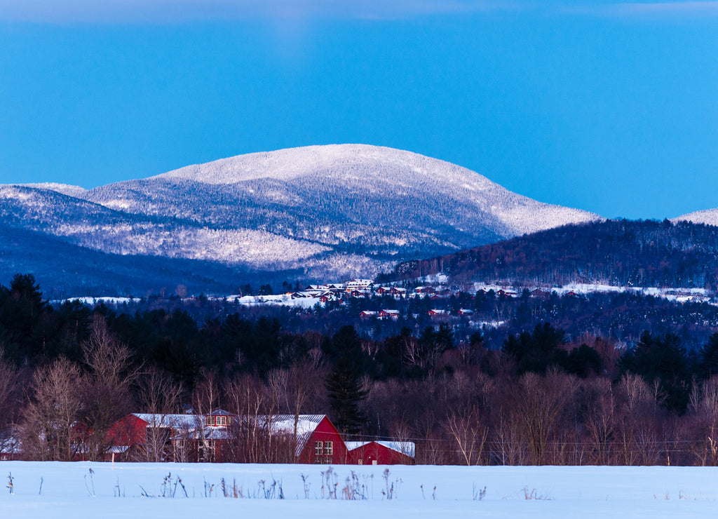 Early winter morning with Trapp Family Lodge nestled in the hills of Stowe, Vermont, USA