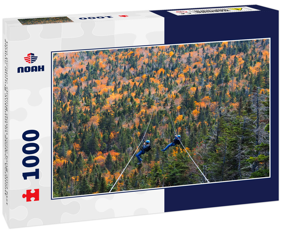 two people sliding down very long and fast zipline during autumn in Stowe, Vermont