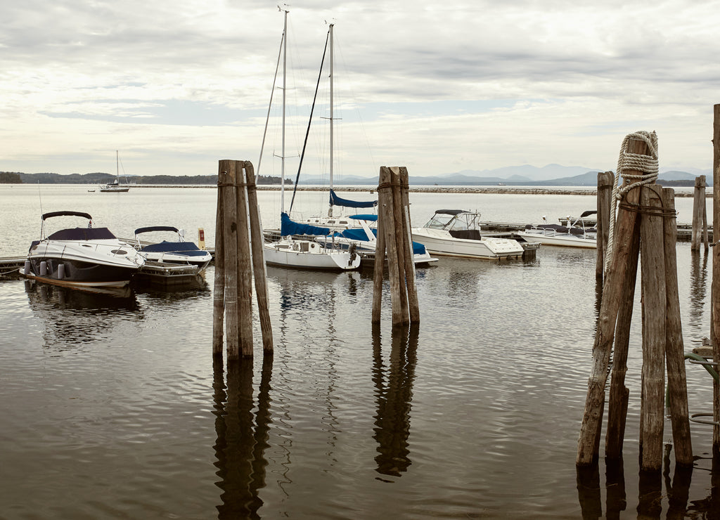 Boats docked along a harbor at Lake Champlain in Burlington, Vermont