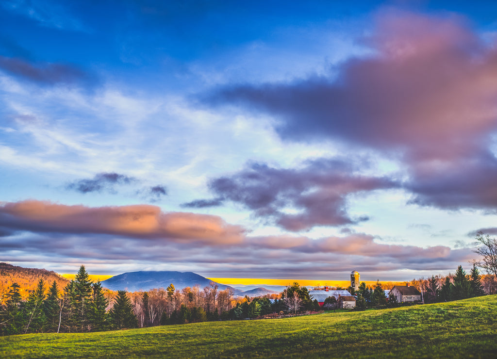 A farm in central Vermont at sunse