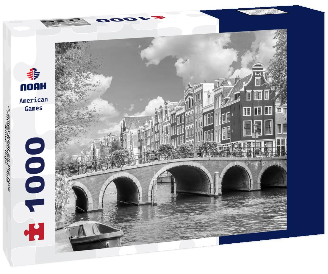 Noah Jigsaw Puzzle A small boat on the Nile River at sunset. Nile River. Jinja - Uganda in black white 1000 pieces