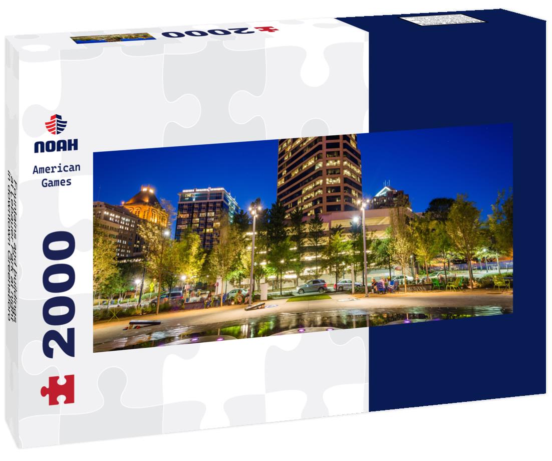 Fountains and buildings at Lebauer Park at night, in downtown Greensboro, North Carolina 2000pc Panoramic Puzzle