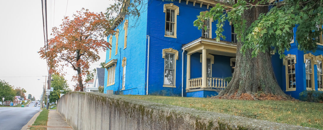 Elizabethtown, Kentucky United States: a blue historic home on a hill during the autumn season 2000pc Panoramic Puzzle