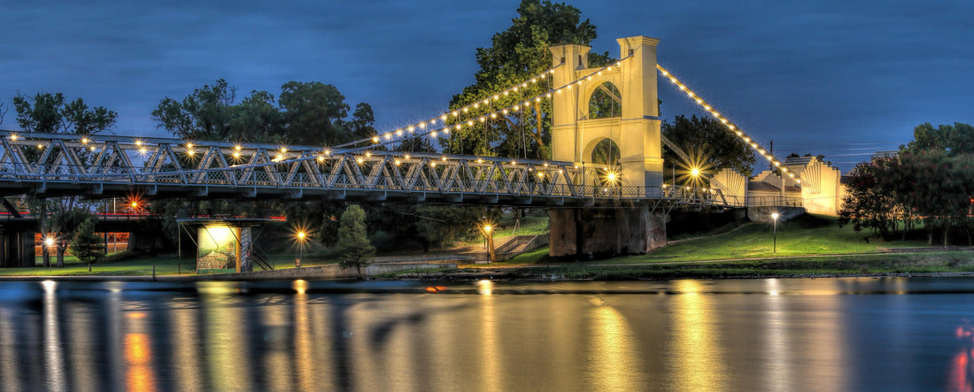 The historic Waco suspension bridge, built in 1870 and located in Indian spring park on the Brazos River 2000pc Panoramic Puzzle