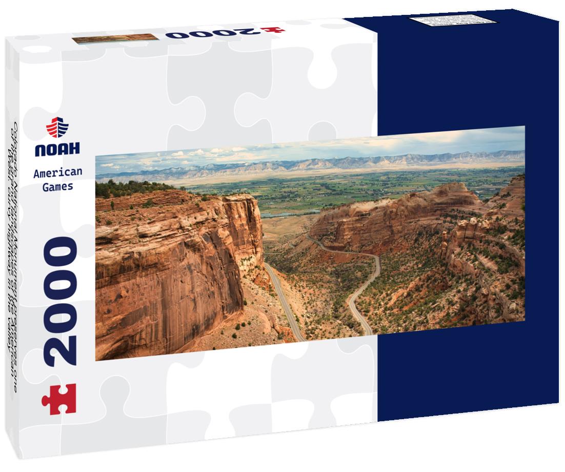 Colorado National Monument preserves one of the grand landscapes of the American West. curvy highway in the valley 2000pc Panoramic Puzzle