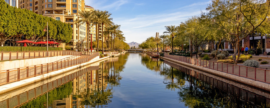 Daytime scene of canal running through waterfront district of Old Town Scottsdale, Arizona USA with condo housing, retail and restaurants 2000pc Panoramic Puzzle