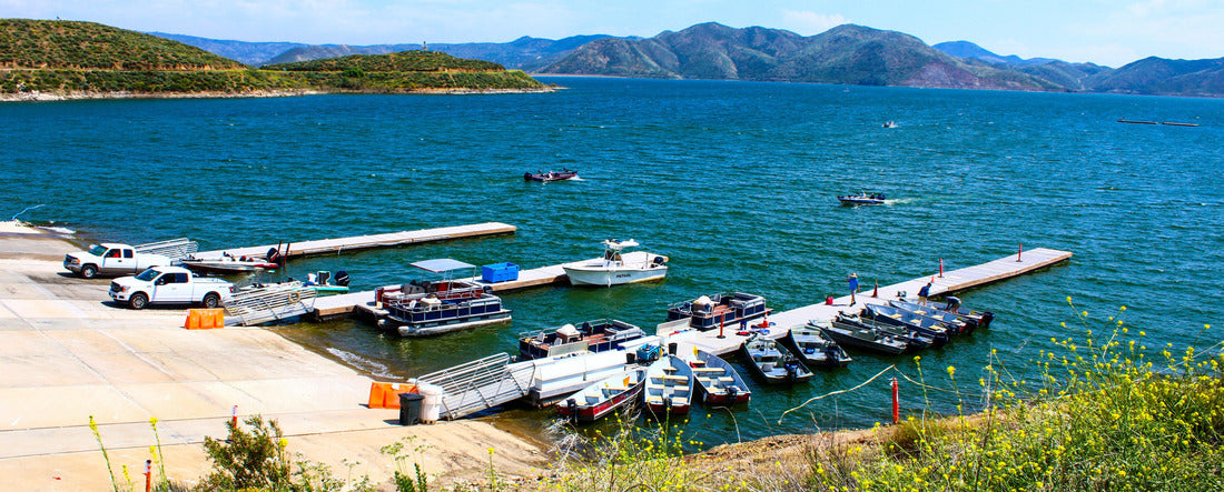 gorgeous shot of boats in the docks and deep blue water, blue skies and lush green mountains at Diamond Valley Lake in Hemet California USA 2000pc Panoramic Puzzle