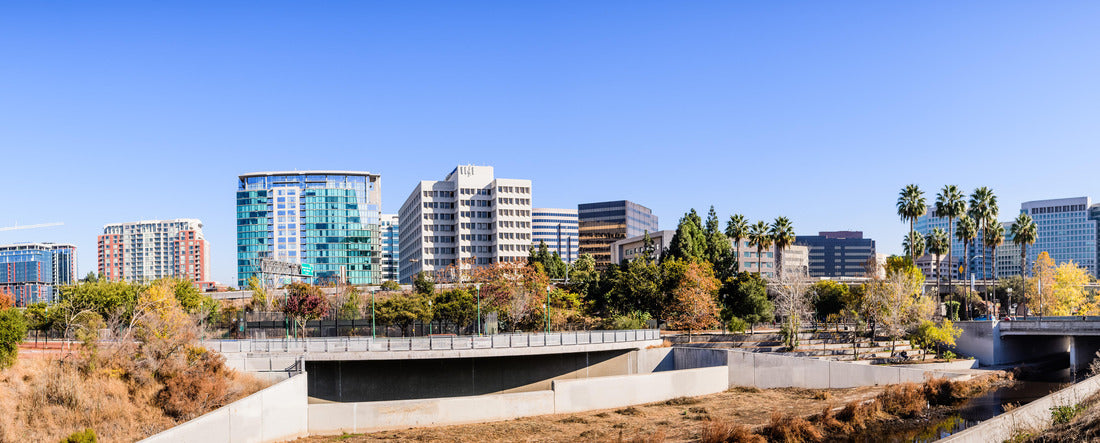 the downtown San José skyline as seen from the banks of the Guadalupe River on a sunny fall day; Silicon Valley, California 2000pc Panoramic Puzzle