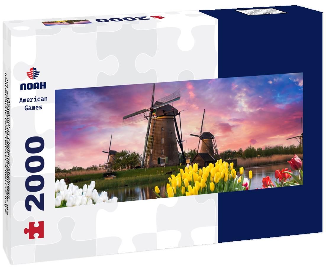 Windmill in Holland Michigan - An authentic wooden windmill from the Netherlands rises behind a field of tulips in Holland Michigan at Springtime 2000pc Panoramic Puzzle
