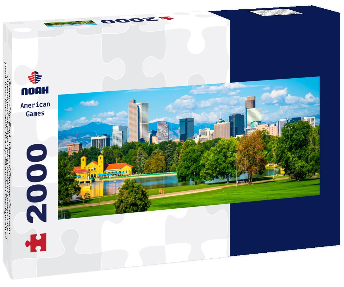 Green City Park View of Denver Colorado downtown skyline rising behind green city park tree line with Rocky Mountain background wide view 2000pc Panoramic Puzzle