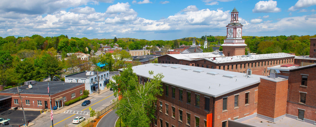 Historic Assabet Woolen Mill, built in 1847, on Main Street on Assabet River in Maynard historic town center in spring, Maynard, Massachusetts, USA 2000pc Panoramic Puzzle