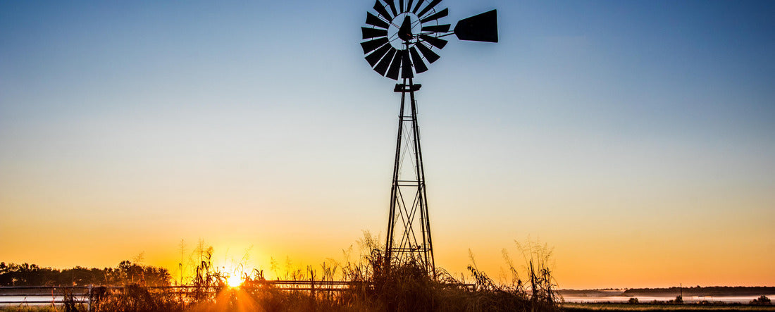 Early Morning Windmill West Point Mississippi. A windmill is a mill that turns the energy of the wind into a rotational energy using sails or blades 2000pc Panoramic Puzzle