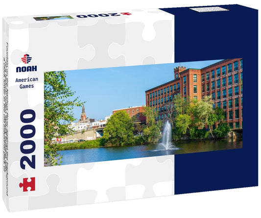 Noah Jigsaw Puzzle Fountain on the Nashua River against the background of a historic cotton factory building with a clock tower in the old industrial park of Nashua. New Hampshire, USA panorama 2000 pieces