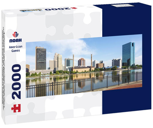 Noah Jigsaw Puzzle A panoramic view of downtown Toledo Ohio's skyline from across the Maumee river at a popular restaurant area with a paver brick boardwalk and a decorative iron railing panorama 2000 pieces