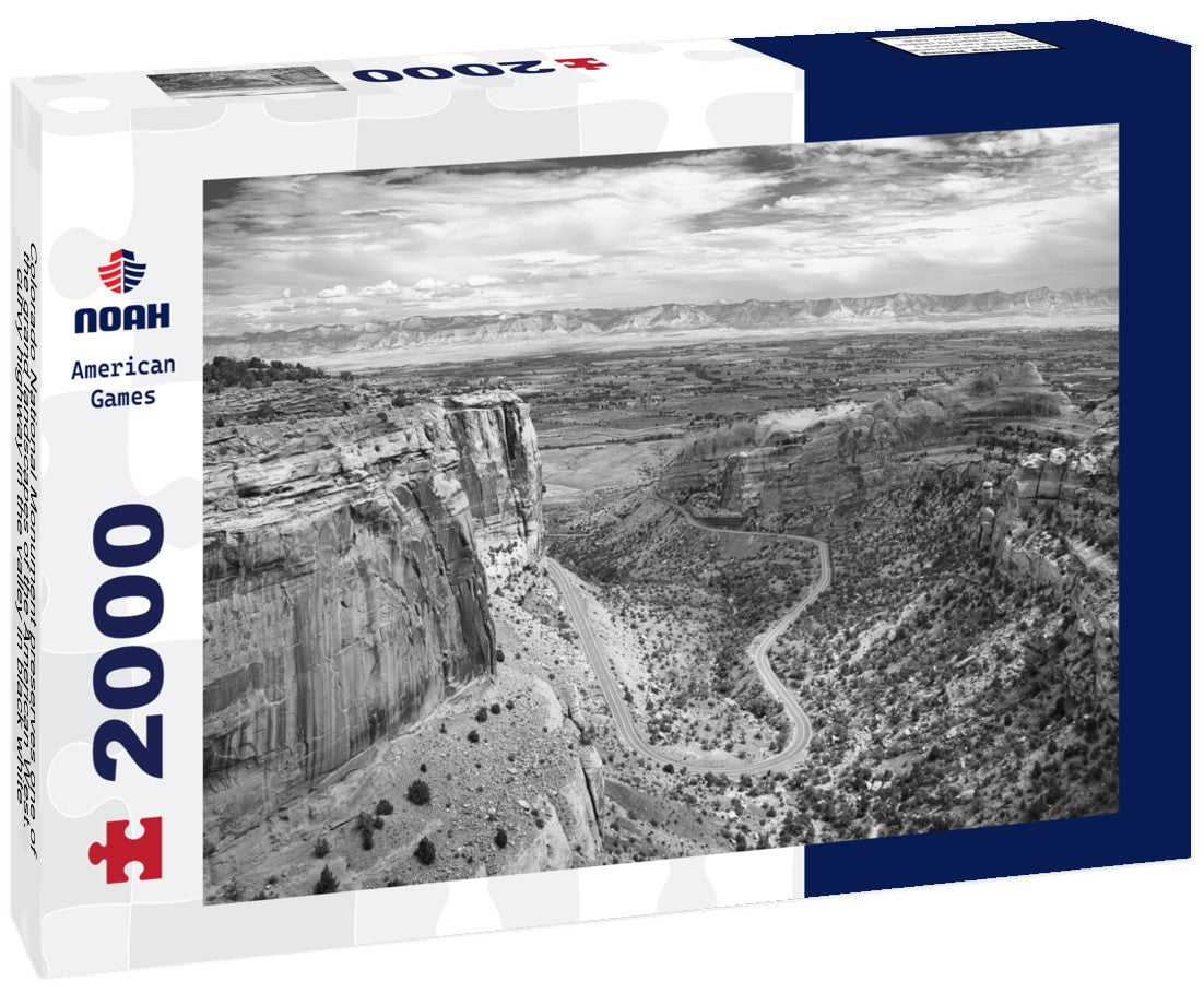 Noah Jigsaw Puzzle Colorado National Monument preserves one of the grand landscapes of the American West. curvy highway in the valley in black white 2000 pieces