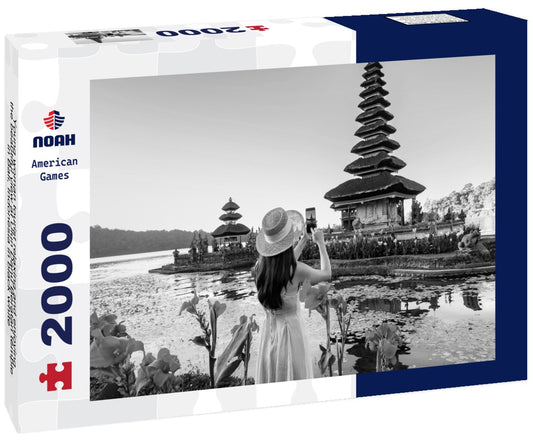 Noah Jigsaw Puzzle Young woman tourist relaxing and enjoying the beautiful view at Ulun Danu Beratan temple in Bali, Indonesia in black white 2000 pieces