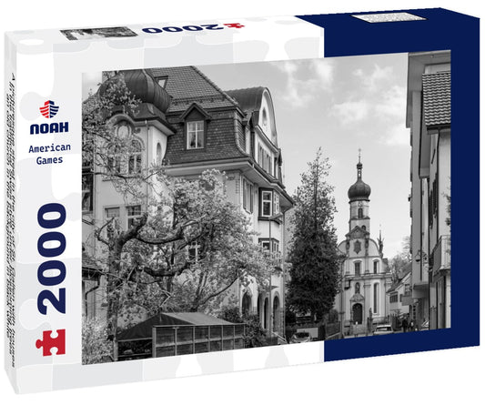 Noah Jigsaw Puzzle A picturesque street in the city of St. Gallen with houses in the traditional Swiss style under blossoming trees, an old church in the background in black white 2000 pieces