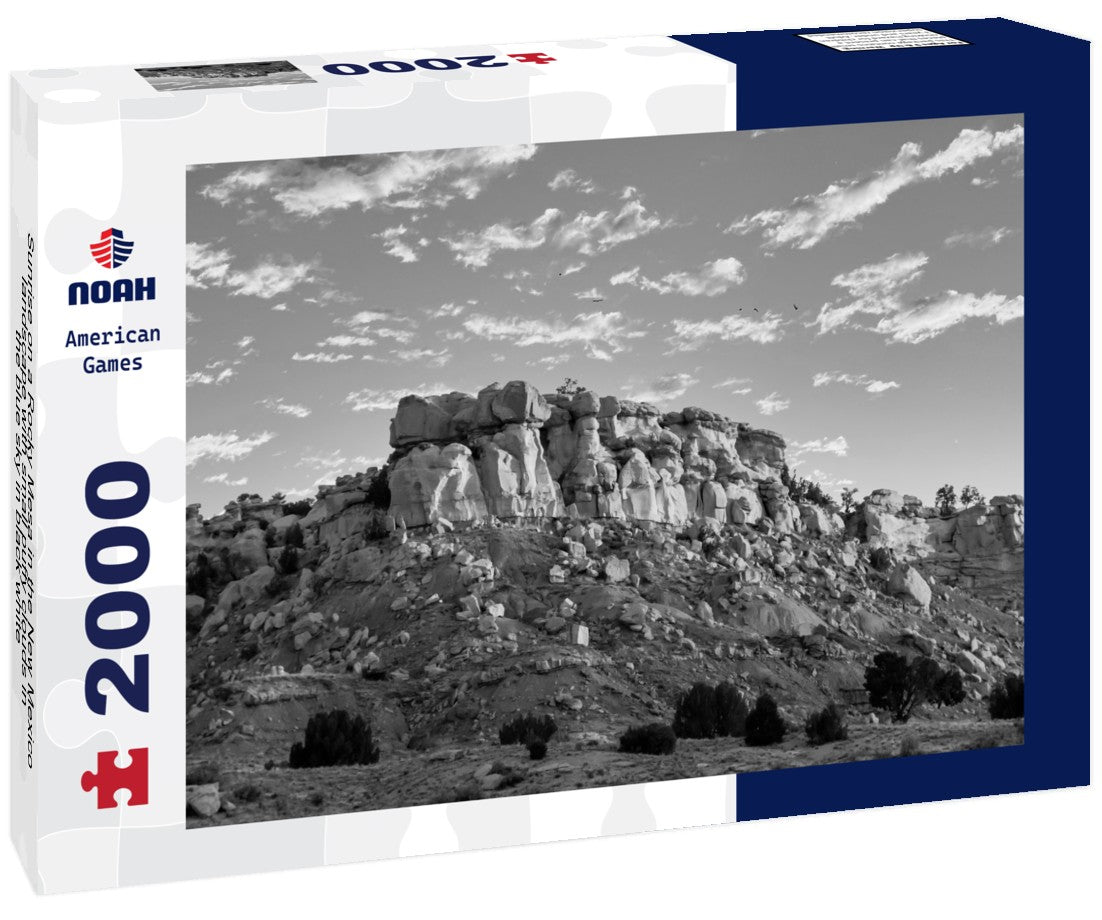 Sunrise on a Rocky Mesa in the New Mexico landscape with small puffy clouds in the blue sky 2000pc PuzzleBlack and White