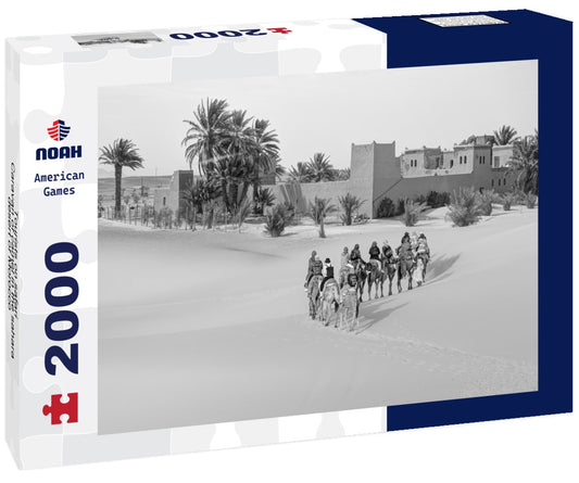 Noah Jigsaw Puzzle Tourists on safari - Caravan of camel in the sahara desert of Morocco - General view of the Merzouga hotels district - Morocco, Africa in black white 2000 pieces
