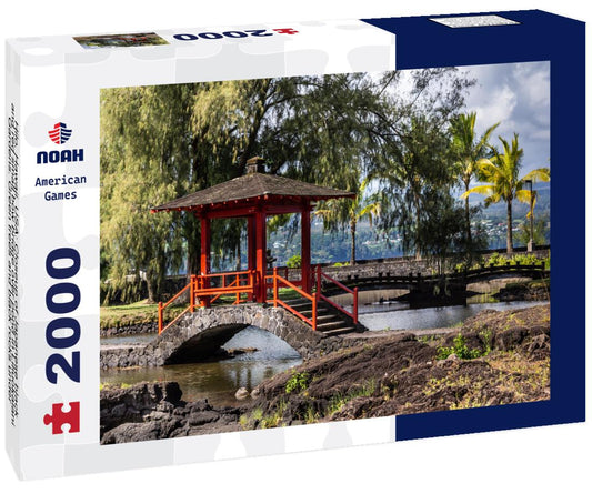 Noah Jigsaw Puzzle Hilo, Hawaii: Closeup of Japanese black and red small bow bridge over pond in Liliuokalani Gardens. Green trees and black rocks under blue sky with big white clouds 2000 pieces