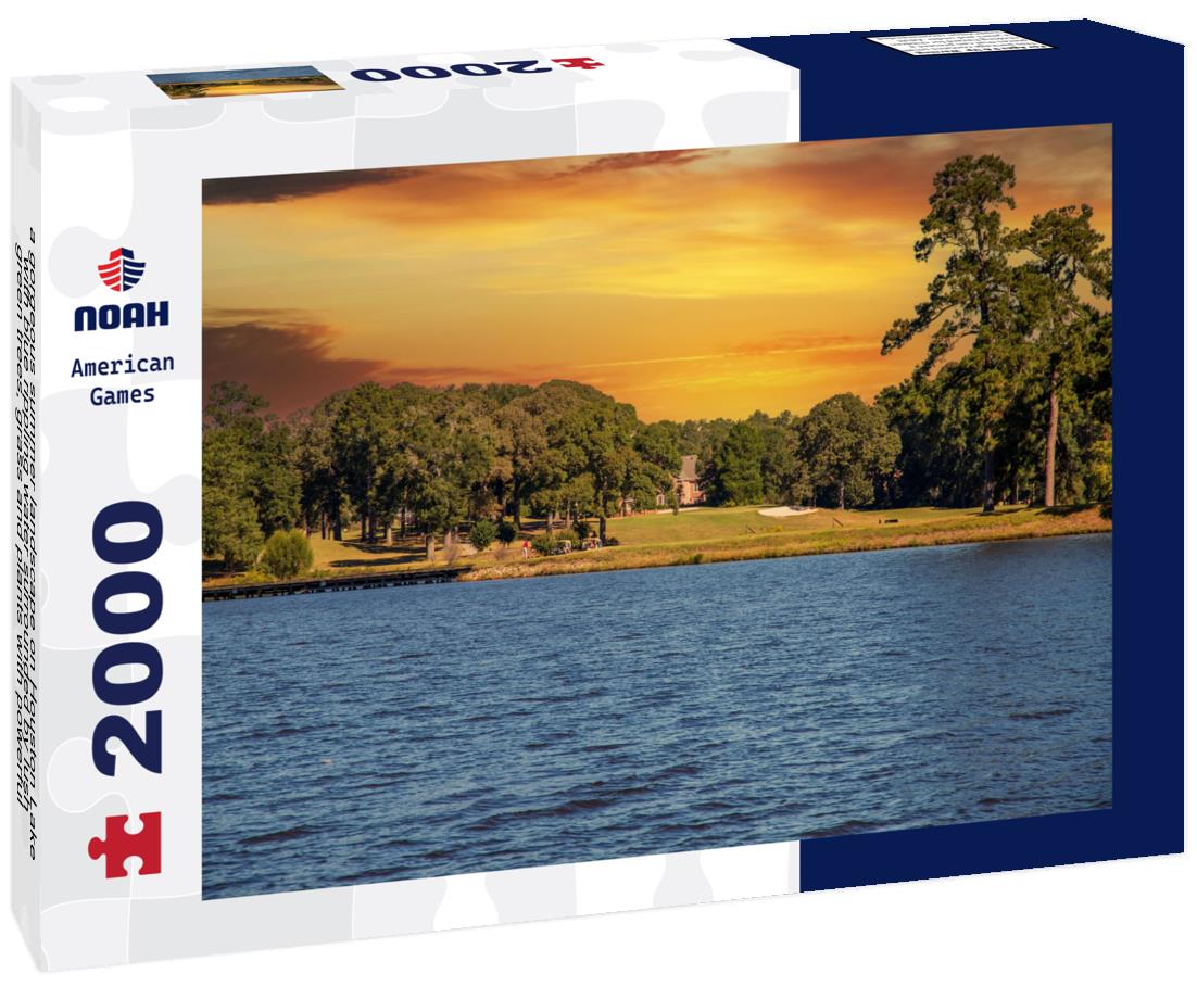 Noah Jigsaw Puzzle a gorgeous summer landscape on Houston Lake with blue rippling water surrounded by lush green trees, grass and plants with powerful clouds at sunset in Perry Georgia USA 2000 pieces