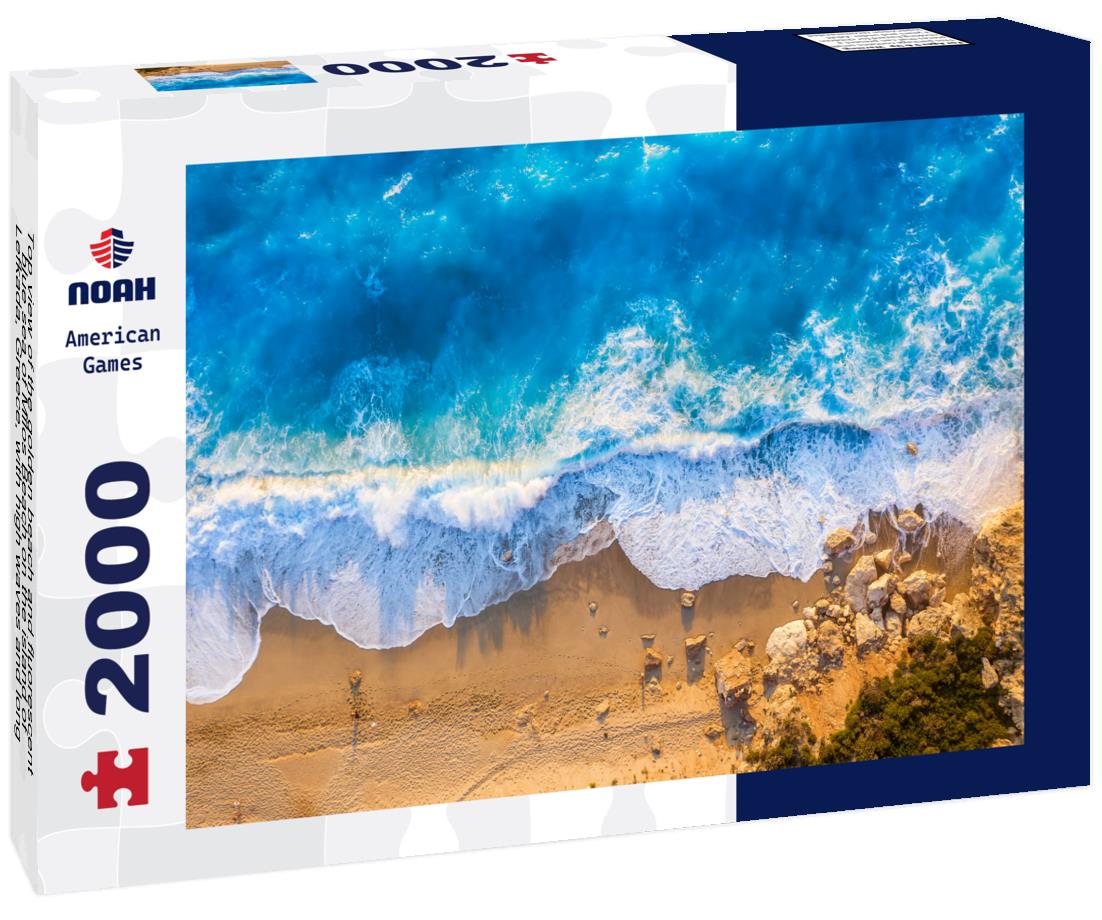 Noah Jigsaw Puzzle Top view of the golden beach and fluorescent blue sea of Milos Beach on the island of Lefkada, Greece, with high waves and long shadows during summer sunset time 2000 pieces