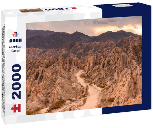 Noah Jigsaw Puzzle The famous Ruta 40 road at sunset winding through the geological wonders of the Quebrada de Las Flechas, Valles Calchaquíes, Salta, Northwest Argentina 2000 pieces