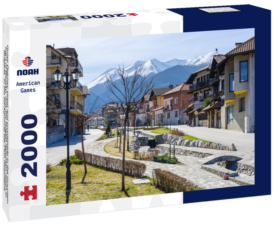 Noah Jigsaw Puzzle Gotse Delchev street and promenade in the mountain town of Bansko, now the largest mountain resort in Bulgaria. In the background the Pirin mountains 2000 pieces