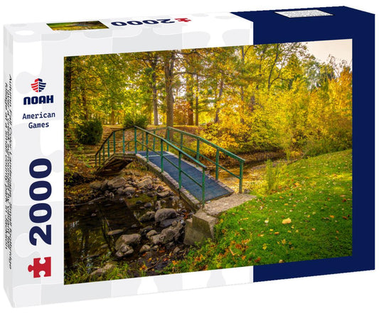 Noah Jigsaw Puzzle Autumn Fall Color Landscape. Small footbridge over a creek surrounded by vibrant fall foliage at a small county park in Jackson County, Michigan 2000 pieces