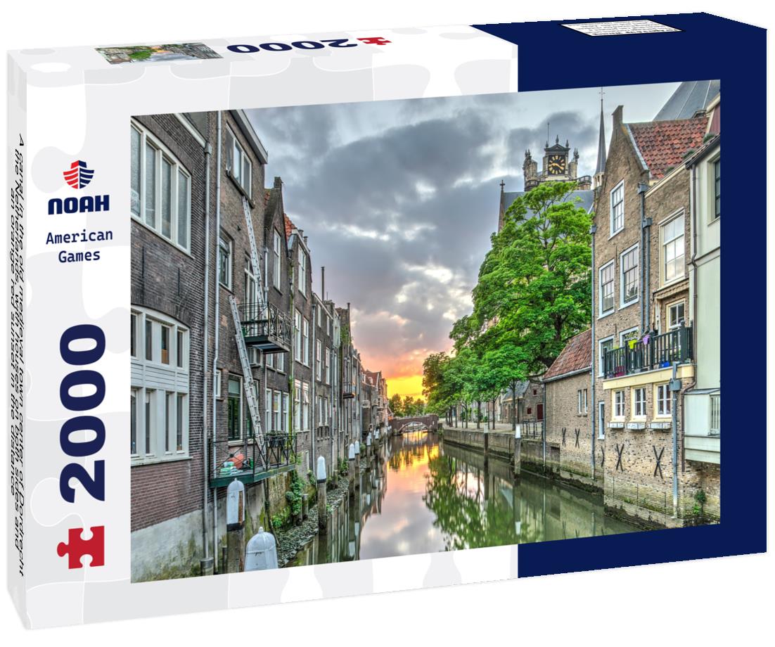 Noah Jigsaw Puzzle A canal in the old medieval town center of Dordrecht, the Netherlands, with houses on both sides and an orange red sunset in the distance 2000 pieces