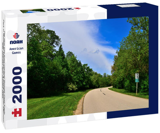Noah Jigsaw Puzzle The slow tree lined roadway through Case Eagle Park in Rochester Wisconsin on a sunny summer afternoon with beautiful light clouded skies 2000 pieces