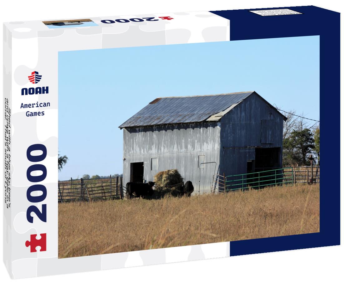 Shed with a blue sky,tree's,and cows with a hay bale in a corral. That's south of Lyons Kansas USA out in the country 2000pc Puzzle