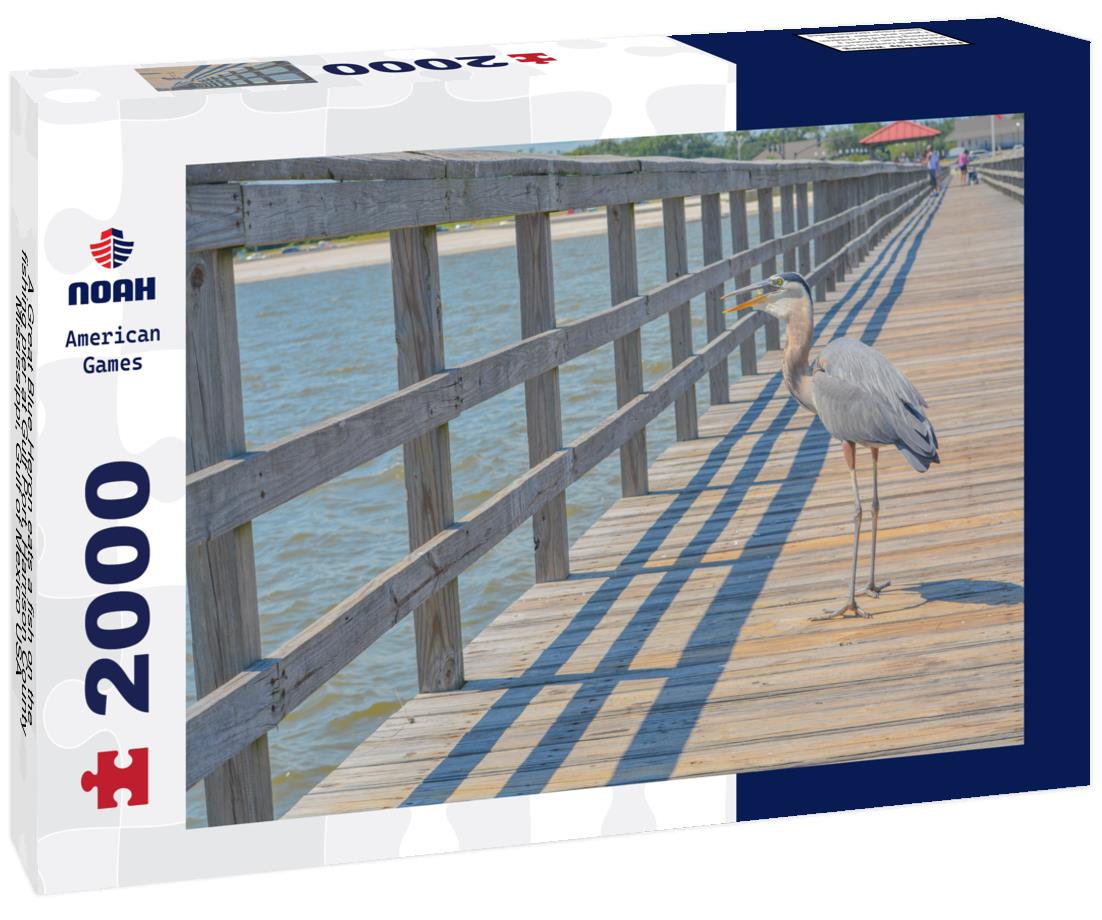 Noah Jigsaw Puzzle A Great Blue Heron eats a fish on the fishing pier at Gulf Port, Harrison County Mississippi, Gulf of Mexico USA 2000 pieces