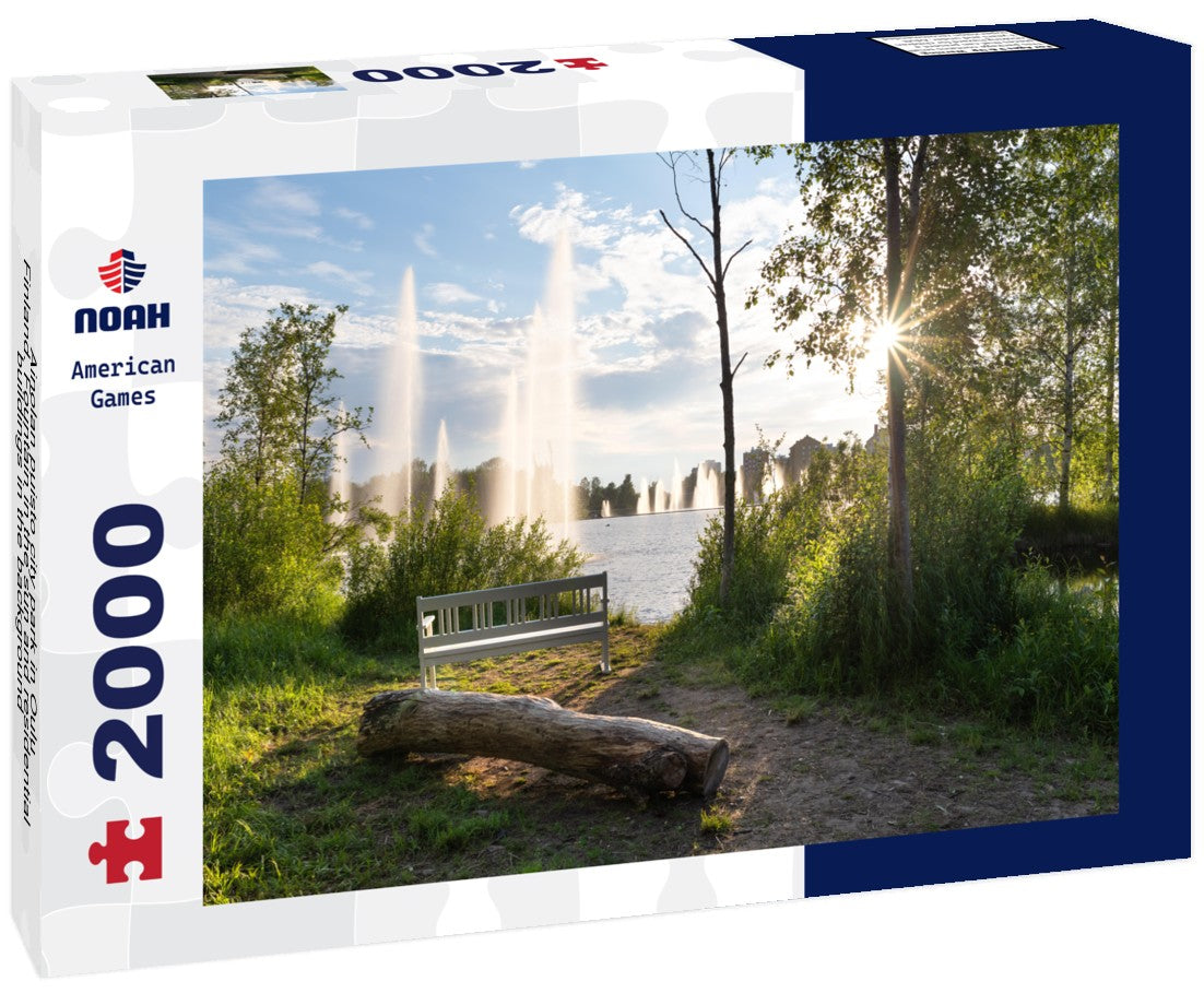 Noah Jigsaw Puzzle Ainolan puisto city park in Oulu, Finland. Fountain in the sun and residential buildings in the background 2000 Pieces