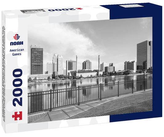 Noah Jigsaw Puzzle A panoramic view of downtown Toledo Ohio's skyline from across the Maumee river at a popular restaurant area with a paver brick boardwalk and a decorative iron railing in black white 2000 pieces