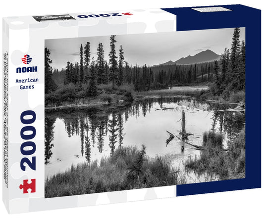 Noah Jigsaw Puzzle A smoky hare hangs over the distant mountains as the sun goes down over a lake in Wrangell-St Elias National Park, Alaska in black white 2000 pieces