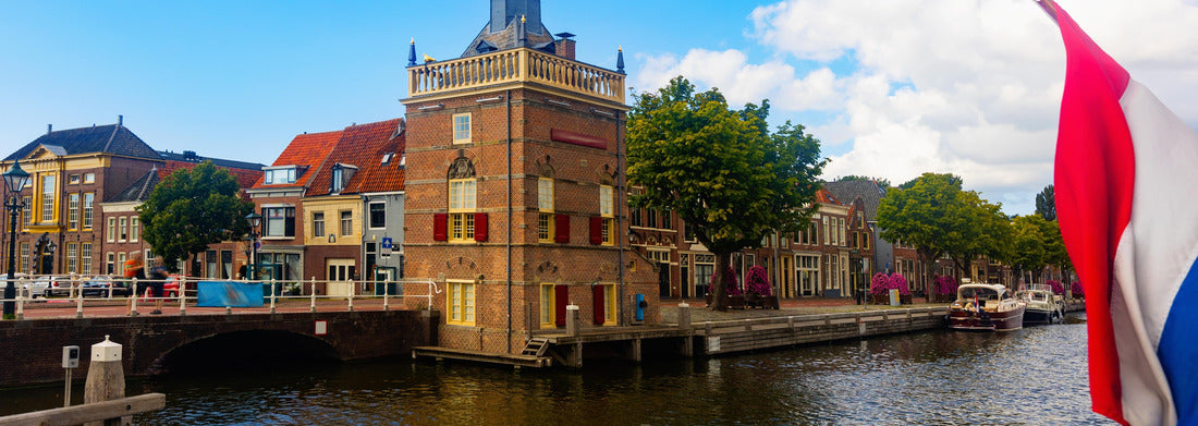 Noah Jigsaw Puzzle Exterior view of the Accijnstoren tower of Alkmaar on the bank of the canal, province of North Holland, Netherlands panorama 1000 pieces