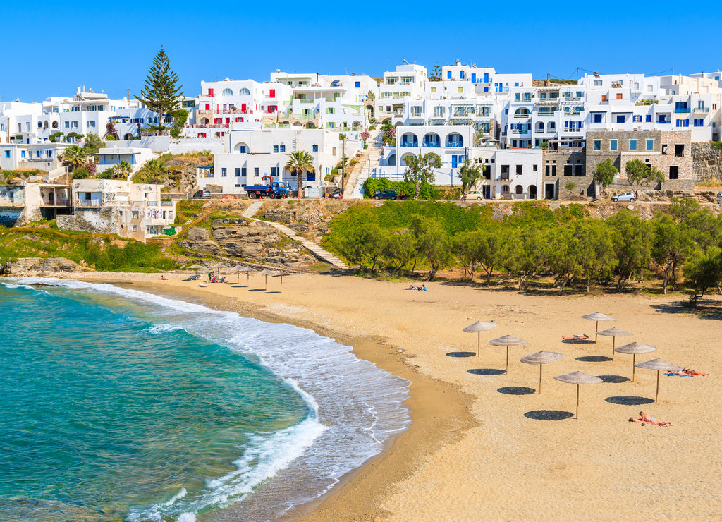 View of beautiful sea bay with beach in Naoussa town, Paros island, Greece