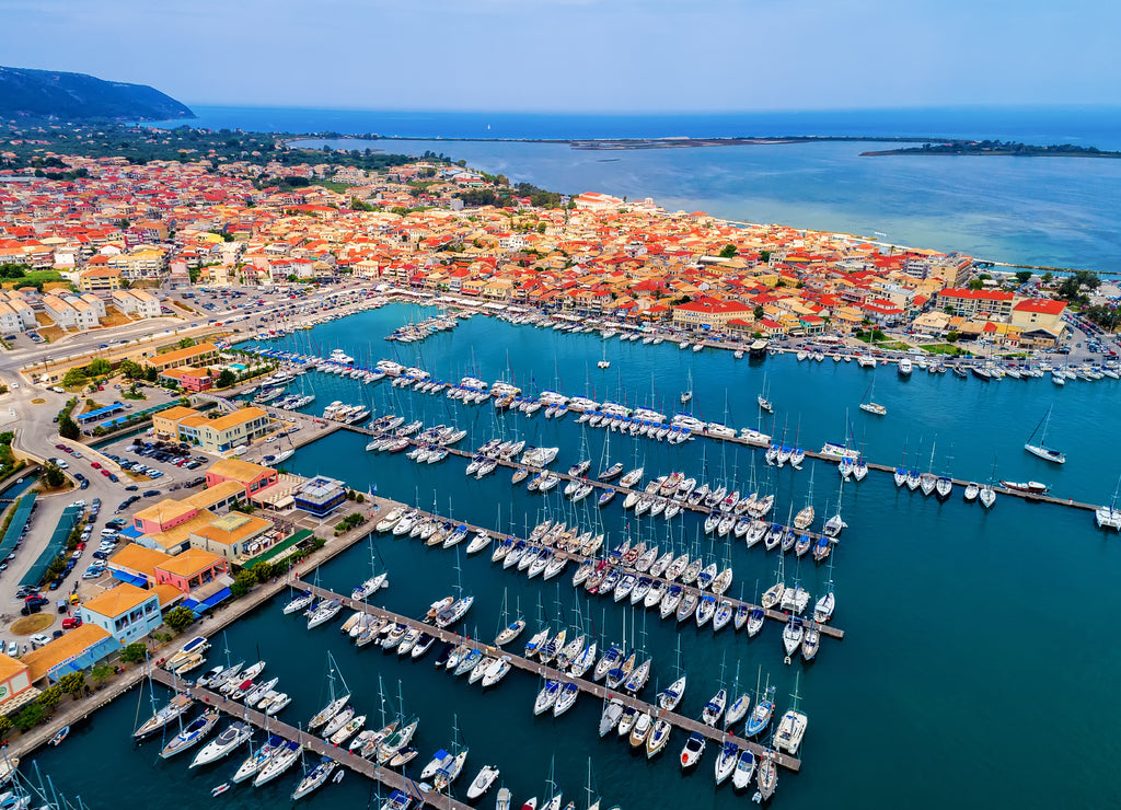 Sailboats in the marina and the city of Lefkada island, Greece