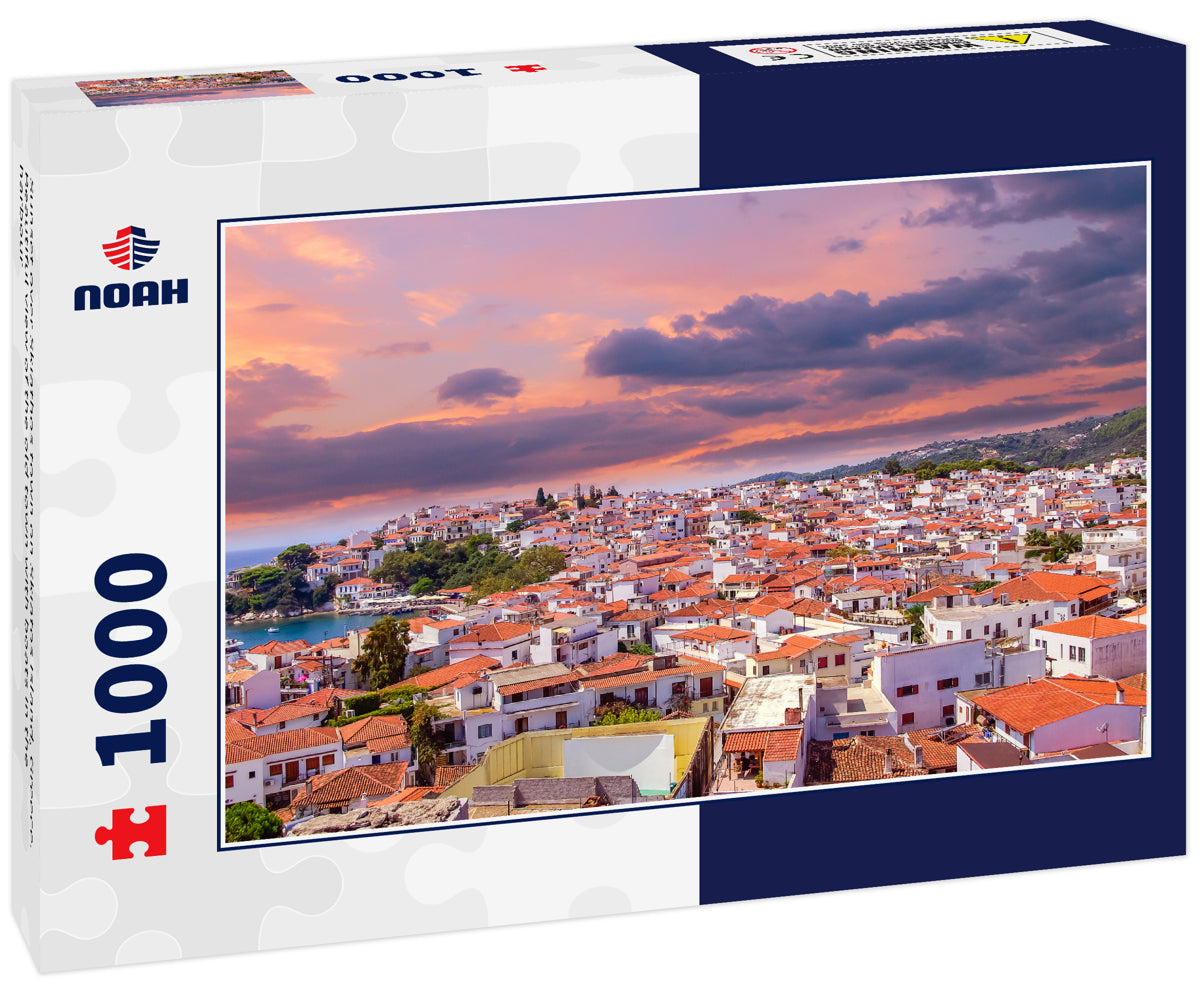 Sunset over Skiathos town on Skiatos Island, Greece. Beautiful view of the old town with boats in the harbour