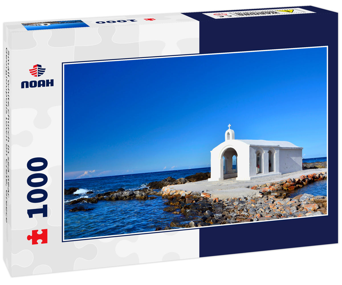 Small white church in sea near Georgioupolis town on Crete, Greece