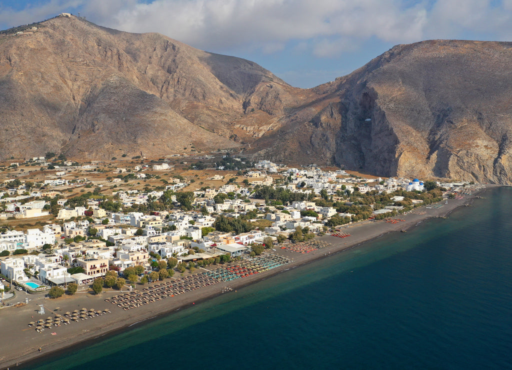 famous volcanic beach and bay of Perissa village, Santorini island, Cyclades, Greece