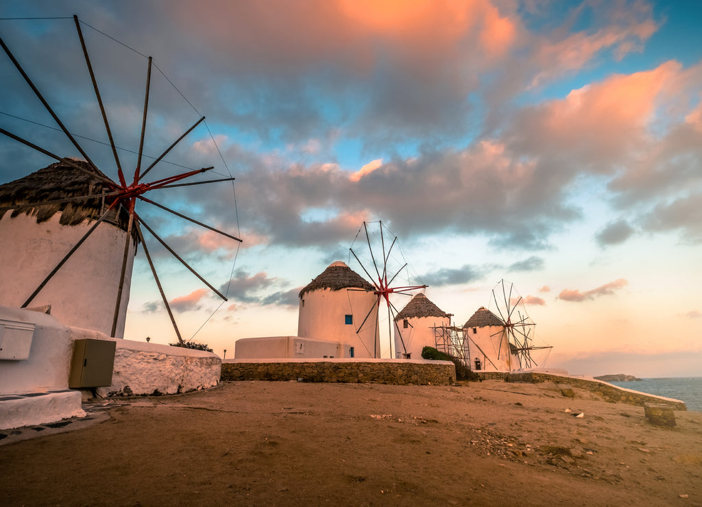 Picturesque view of Mykonos windmills at sunset