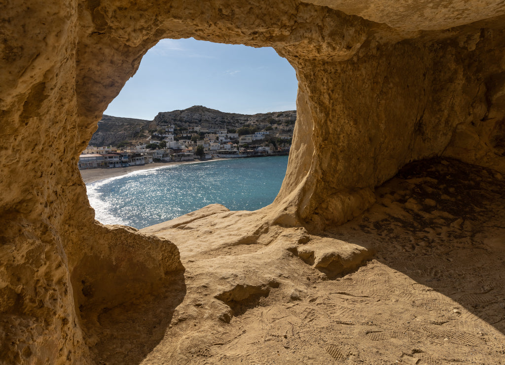 Stunning Roman catacombs carved on the sandstone cliffs above the Matala Beach, Crete, Greece