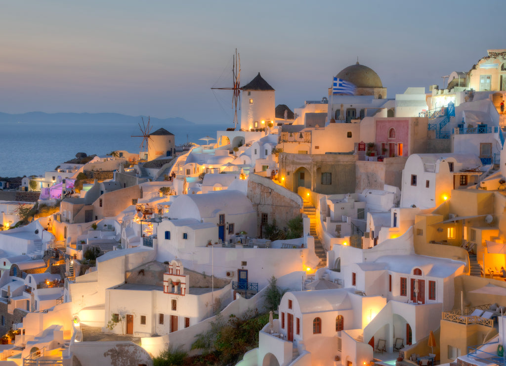 Sunset over Oia village In Santorini island, Greece