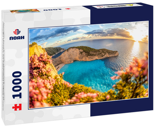 Navagio beach with shipwreck against colorful flowers on Zakynthos island, Greece