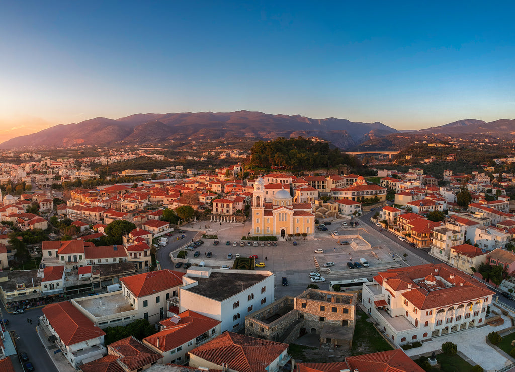 Aerial view around the castle hill area and the Metropolitan church of Ypapanti in the old historical town of the seaside Kalamata city, Greece