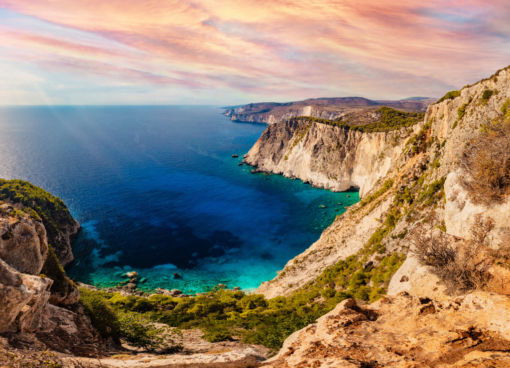 Zakynthos in Greece, Keri cliffs and Ionian sea at sunset